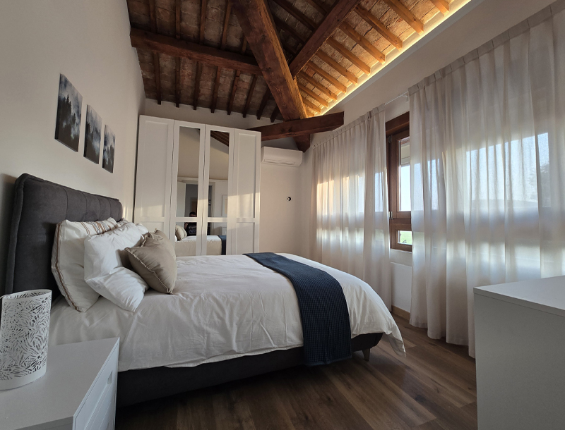 Camera da letto presso le Residenze la Barchessa