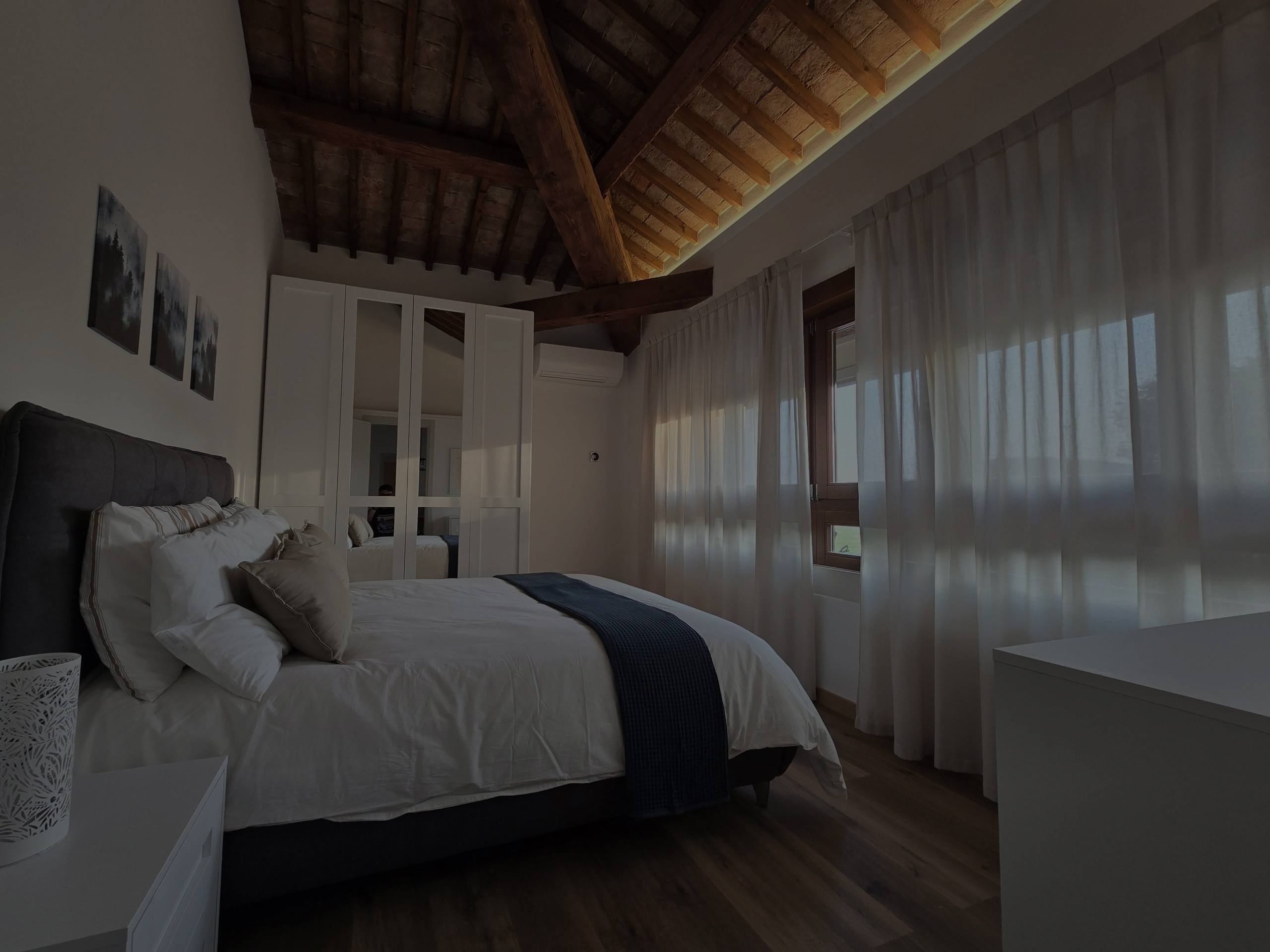Camera da letto dentro Residenze la Barchessa
